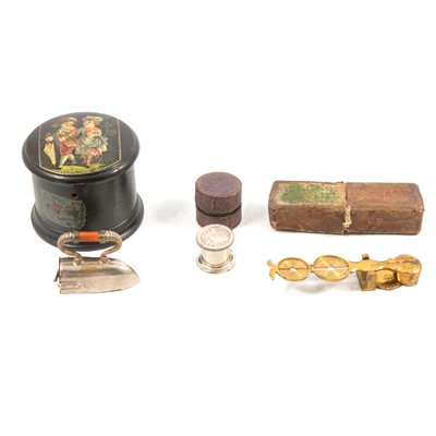 Lot 116 - Harrison brass sovereign scales, tablet crusher, novelty tape measure and thread box.