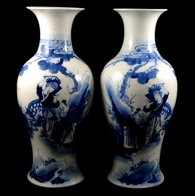 Lot 27 - A pair of Chinese blue and white vases, and another similar vase