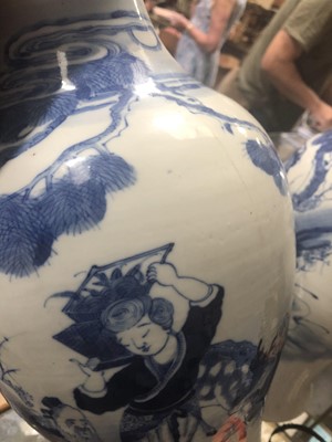 Lot 27 - A pair of Chinese blue and white vases, and another similar vase