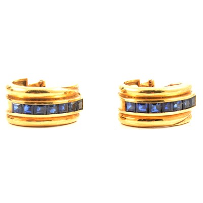 Lot 245 - A pair of sapphire hoop earrings.