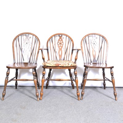 Lot 340 - Set of five reproduction elm and beech wheel back Windsor chairs