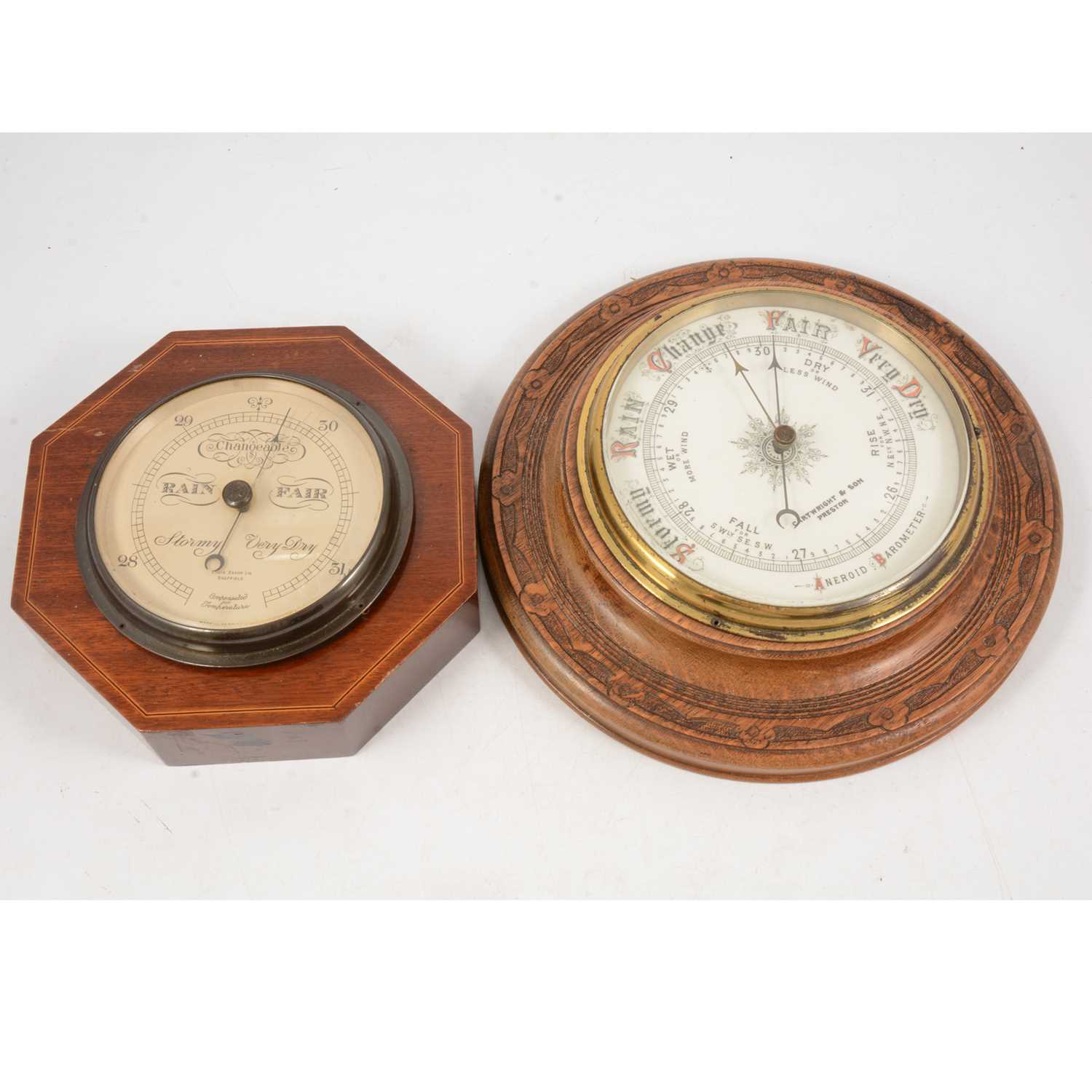 Lot 250 - A collection of Eleven barometers and a brass cased ships clock and barometer.