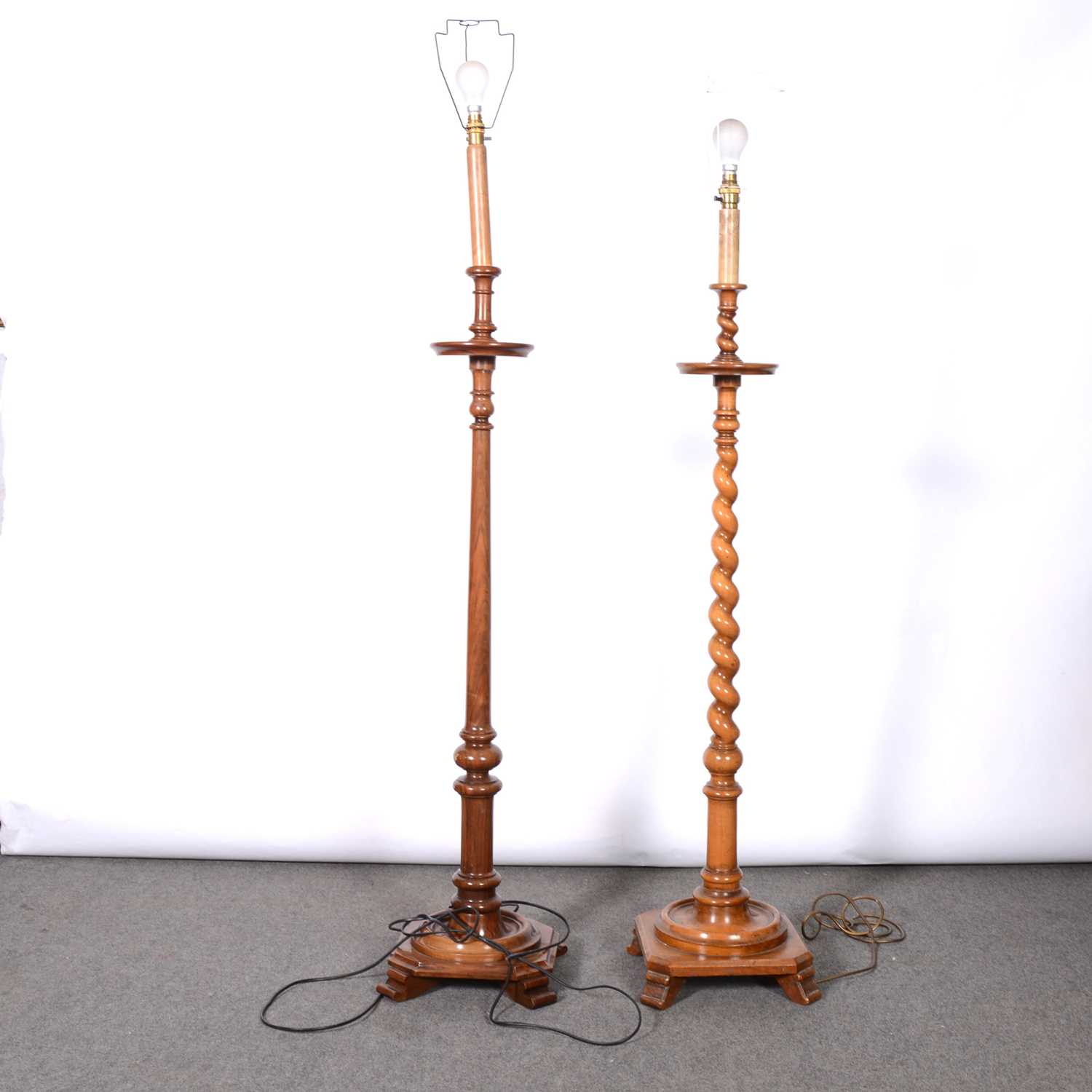 Lot 19 - Two modern wooden standard lamps