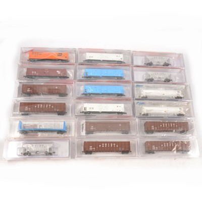 Lot 557 - Eighteen N gauge model railway refrigerator cars, box cars, tanker wagons, and others