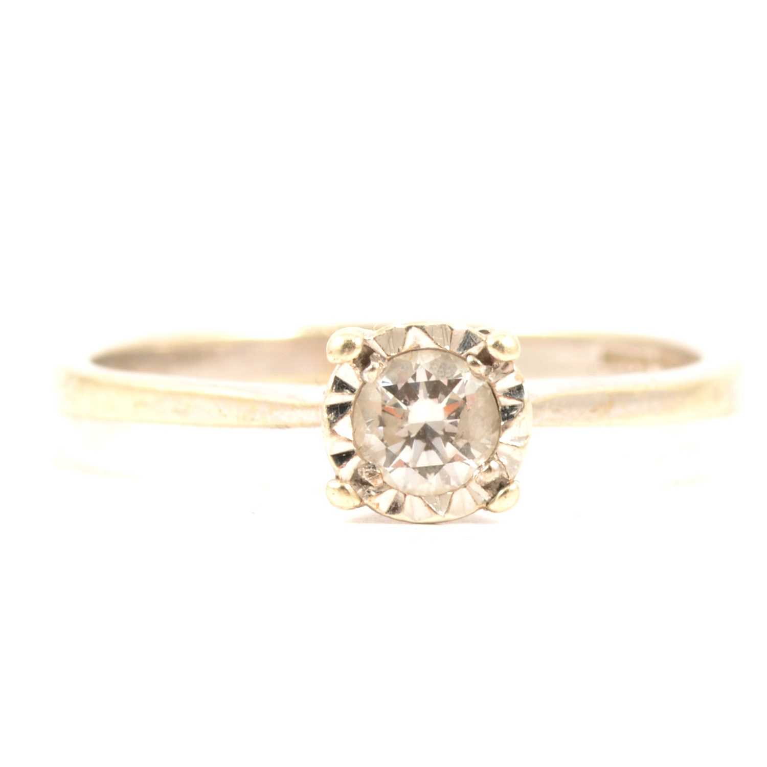 Lot 6 - A diamond solitaire ring.