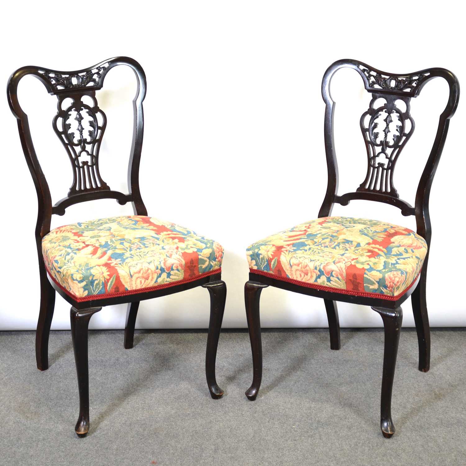 Lot 100 - Pair of late Victorian mahogany salon chairs.