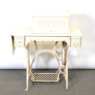 Lot 51 - Two vintage hand-turn sewing machines, and a painted treadle machine
