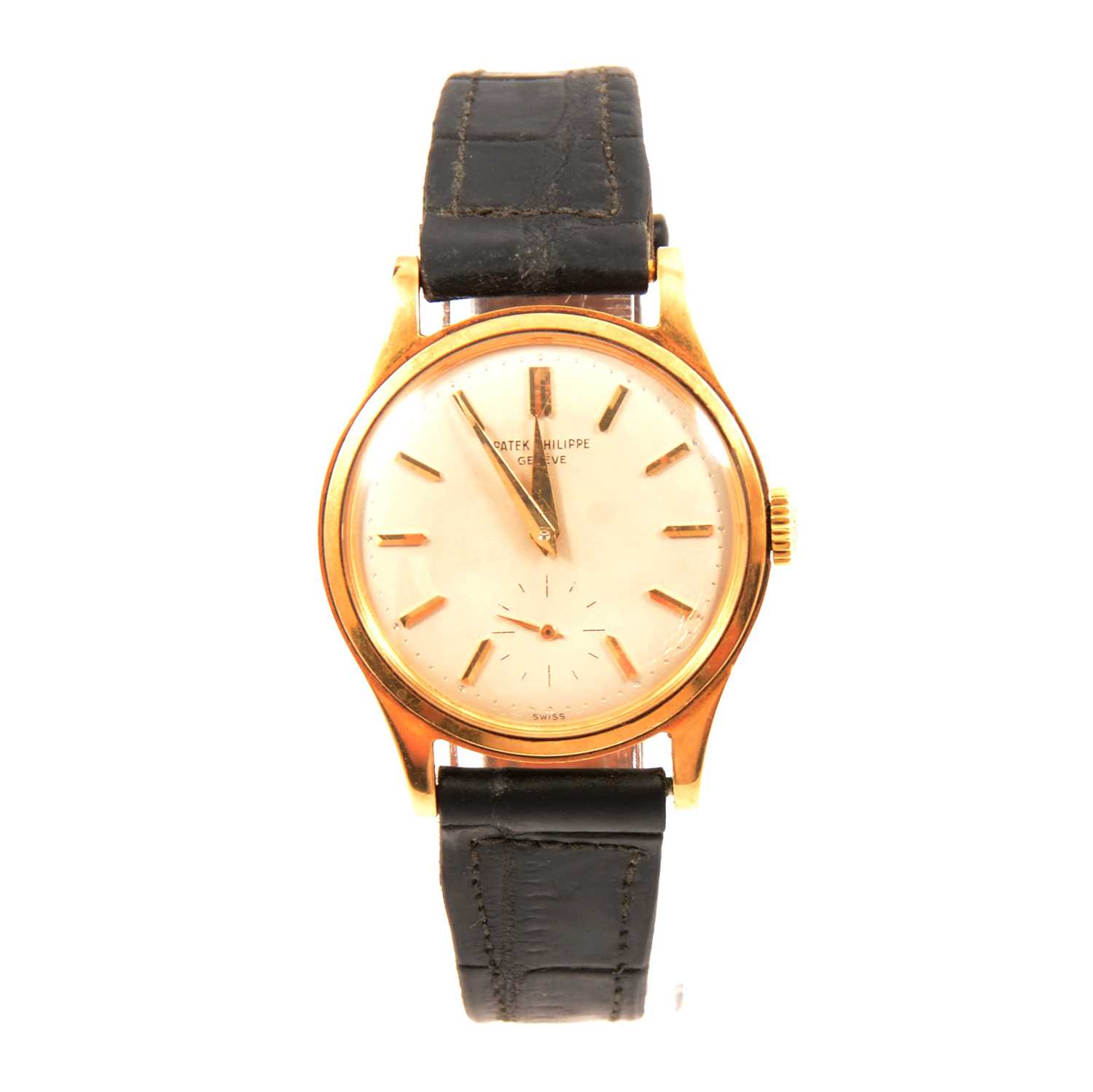 309 - Patek Philippe - a gentleman's yellow metal wristwatch.