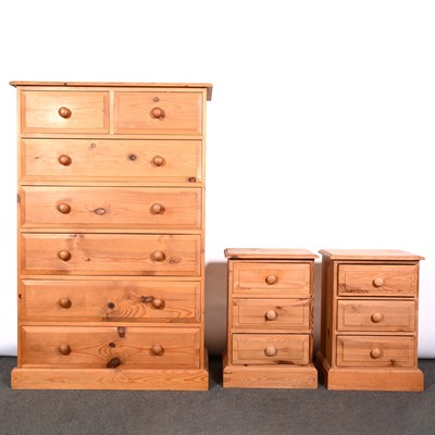 Lot 396 - Modern pine chest of drawer and matching bedside pedestals