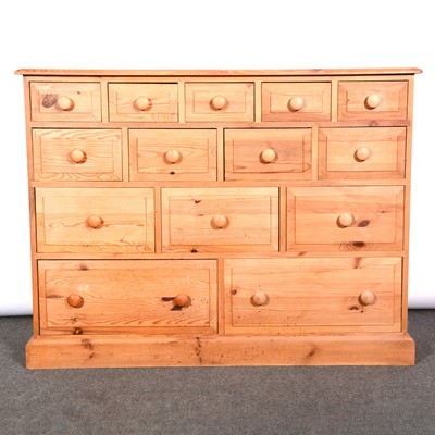 Lot 397 - Modern pine chest of drawers and a pine framed wall mirror