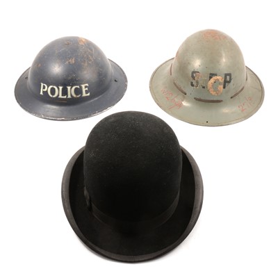 Lot 112 - Two 1930s Brodie helmets and a 'Goodwood' bowler hat