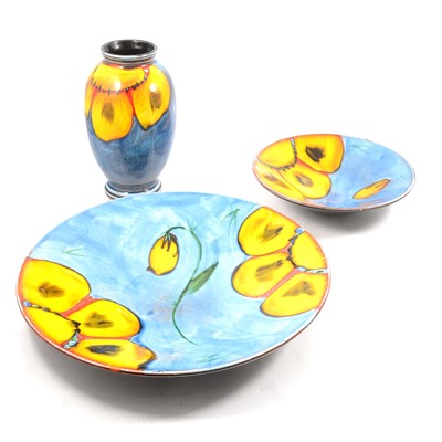 Lot 71 - Poole Pottery Wild Poppy pattern wall charger, bowl and vase.