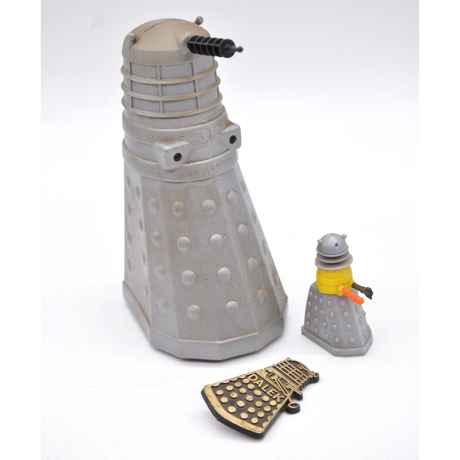 Lot 1187 - Two Doctor Who Dalek toys and a badge.