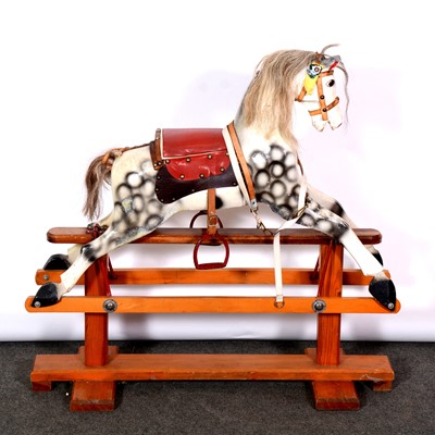 Lot 420 - Victorian style rocking horse, carved and painted, on a pine trestle base