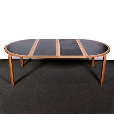 Lot 402 - Rud Thygesen and Johnny Sorensen for Magnus Olesen, a circular table with six associated chairs