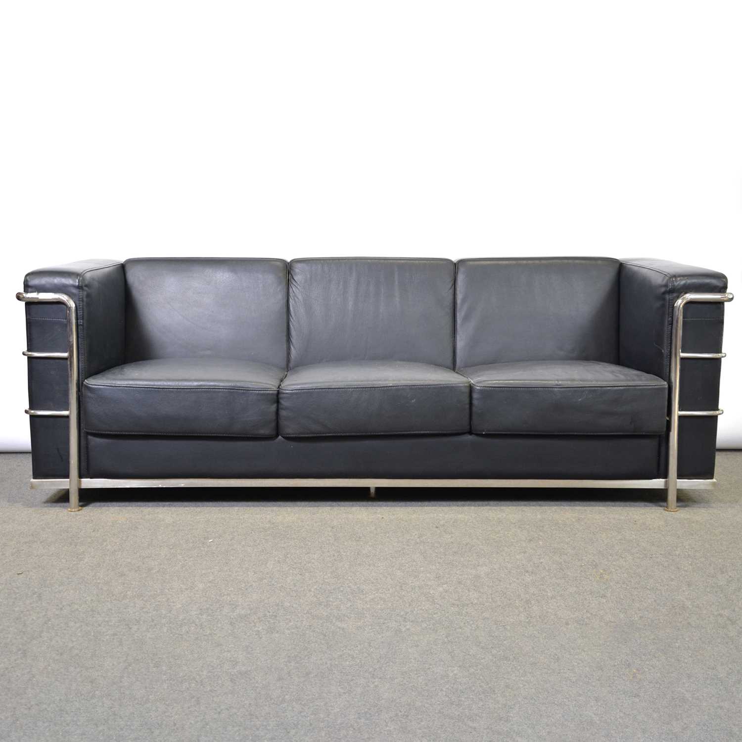 Lot 456 - Chrome and leather sofa after Le Corbusier