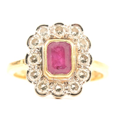 Lot 68 - A ruby and diamond cluster ring.