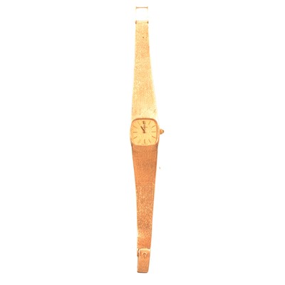 Lot 343 - Omega - a lady's 9 carat yellow gold bracelet watch.