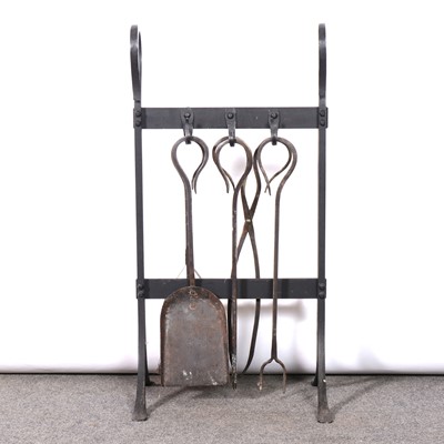 Lot 429 - An Arts & Crafts wrought iron fire companion