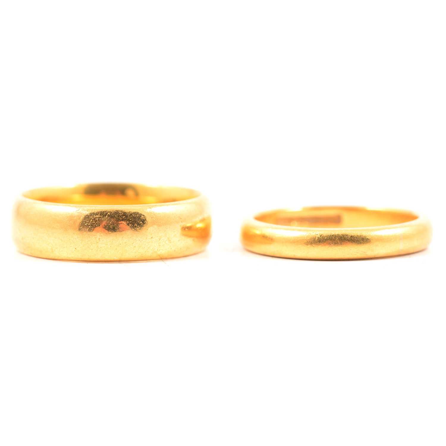 Lot 126 - Two 22 carat yellow gold wedding bands.