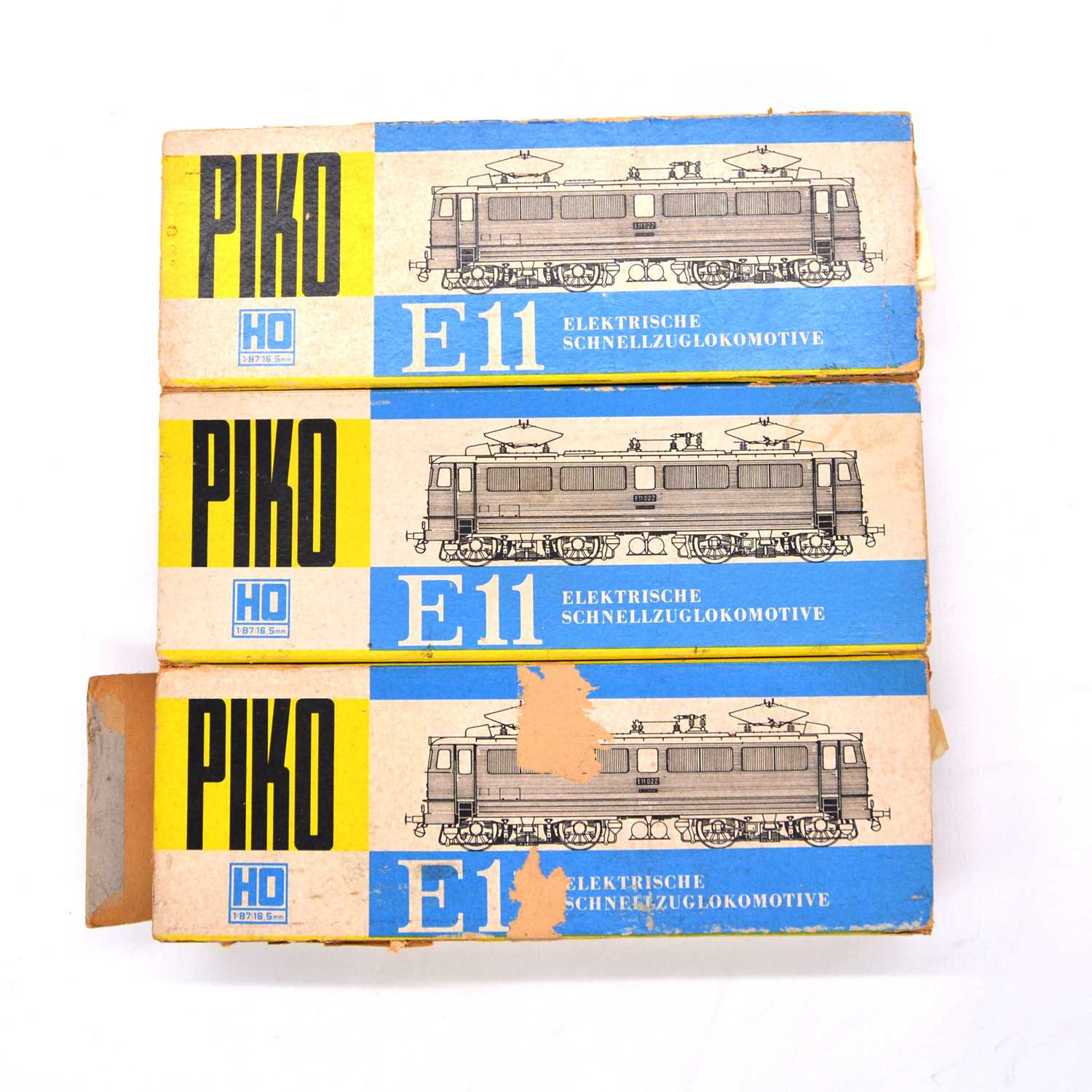 Lot 101 - Piko HO gauge model railway locomotives, three including Lok E11 022