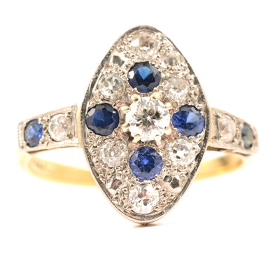 Lot 46 - A sapphire and diamond marquise cluster ring.
