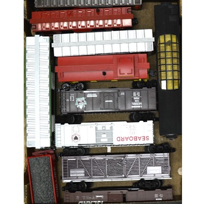 Lot 160 - Eleven O gauge model freight cars, rolling-stock and observation coach.