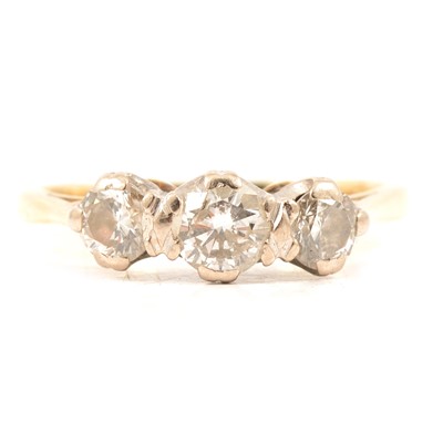 Lot 19 - A diamond three stone ring.