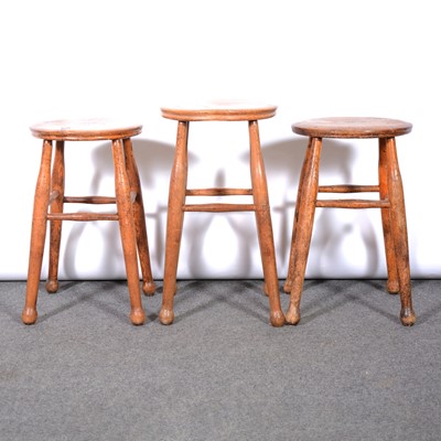 Lot 376 - Three ash factory stools