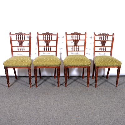 Lot 332 - Set of four Victorian walnut carved back dining chairs