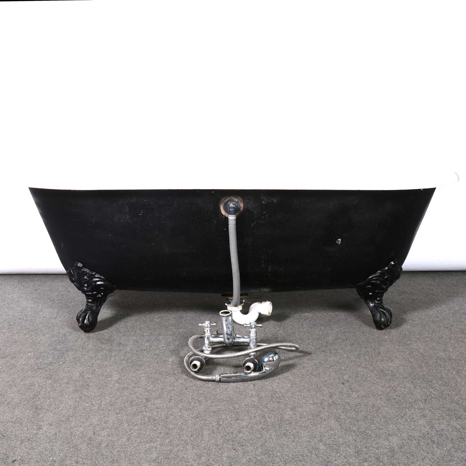 Lot 203 Freestanding cast iron roll top bath