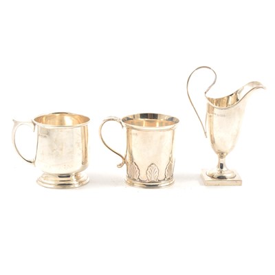 Lot 234 - silver Christening cup, Charles Boyton & Son Ltd, Birmingham 1932, another cup and a cream jug.