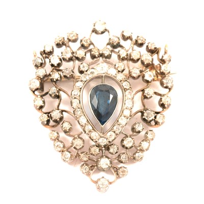 Lot 197 - A sapphire and diamond brooch.