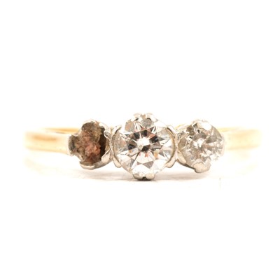 Lot 217 - A diamond three stone ring, missing one diamond.