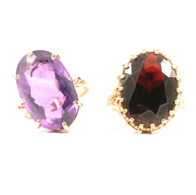 Lot 99 - Two dress rings, garnet and amethyst.