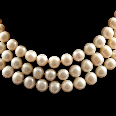 Lot 237 - A cultured pearl three row choker necklace.