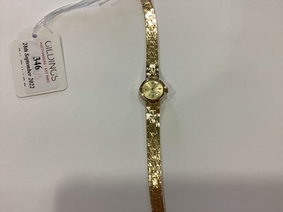 Lot 346 - Rolex - a lady's 9 carat yellow gold cocktail watch.