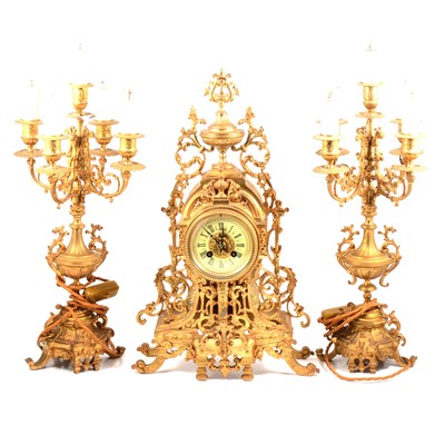 Lot 221 - French gilt metal three-piece clock garniture