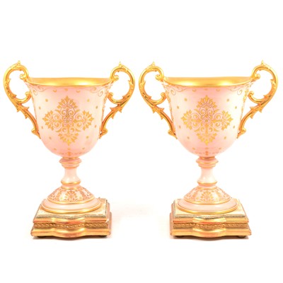 Lot 5 - Large pair of ornamental Coalport vases, on stands