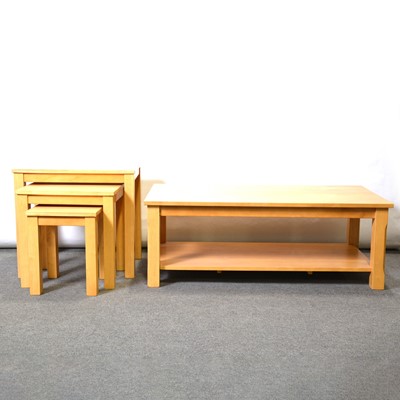 Lot 355 - Light wood coffee table and a similar nest of tables