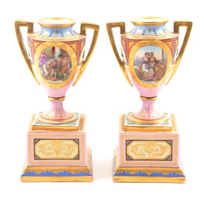 Lot 127 - Pair of Viennese porcelain urn shaped vases on plinths