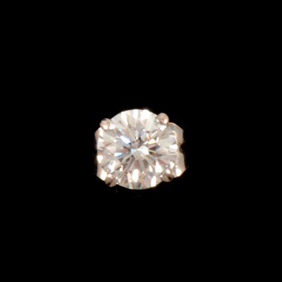 Lot 252 - A single diamond solitaire stud earring.