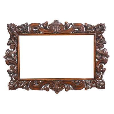 Lot 391 - Victorian wall mirror, carved oak frame