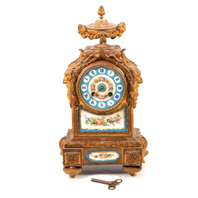 Lot 174 - A 19th Century French ormolu and porcelain mantel clock