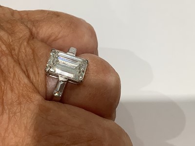 Lot 15 - A diamond solitaire ring, emerald step cut stone, 2.62 carats.