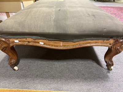 Lot 438 - A large walnut framed cabriole leg stool with ceramic castors in need of restoration.