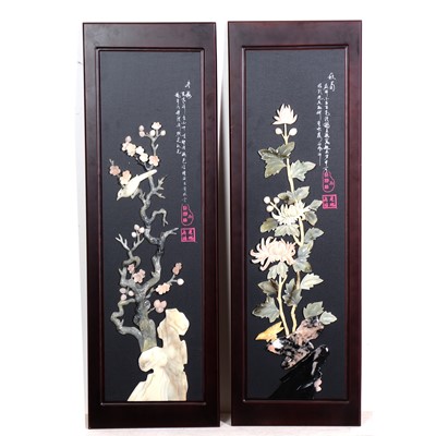 Lot 326 - A pair of Chinoiserie black lacquered wall plaques