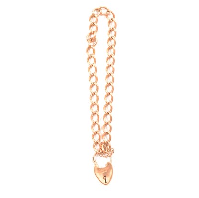 Lot 177 - A 9 carat rose gold curb link bracelet.