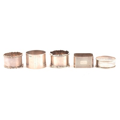 Lot 279 - Silver napkin ring, maker's mark rubbed, Chester 1921, and four others.