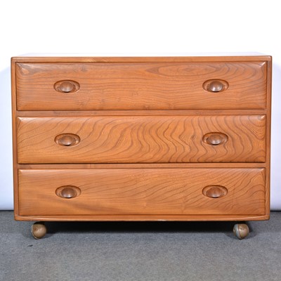 Lot 376 - An Ercol wardrobe and a chest of drawers